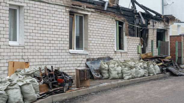 Professional Fire Damage Removal technician working in Spring Valley, WI